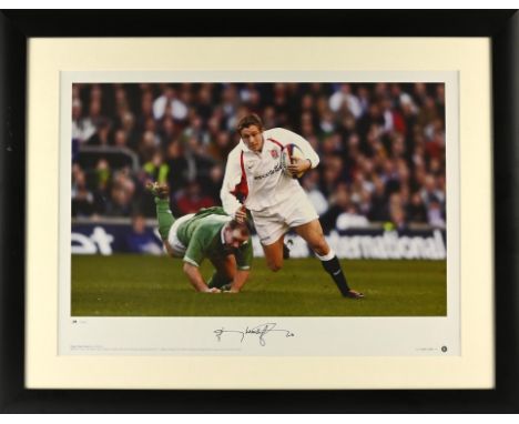 Jonny Wilkinson Signed photograph - Man of the Match Jonny Wilkinson, breaks clear of Frank Sheahan during England's 45-11 de