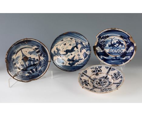 Set of four 18th century Spanish dishes.2 of them Catalan "Faixes i Cintes", 2 Aragonese.In glazed ceramic.They show faults i
