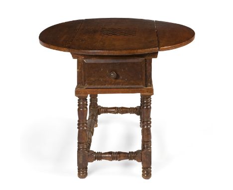 Baroque side table, ca.1700.Walnut wood with marquetry on the top.With lateral wings.With xylophages. Wear and tear due to us