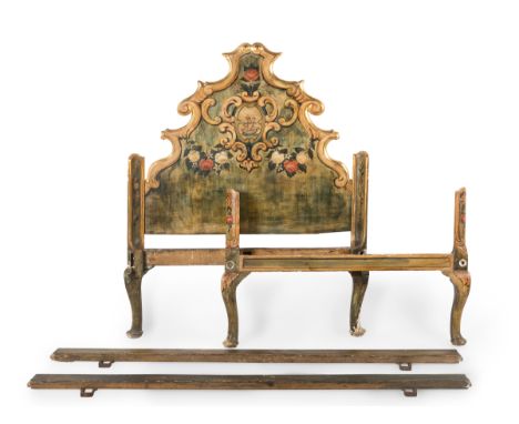 Olotine single bed, 18th century.Carved, polychromed and gilded wood.The polychromy is missing.The bed is complete.Measuremen