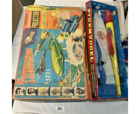 A Chad valley Thunderbirds Give A Show projector. Box A/F &amp; A Gunther Flugspiel glider