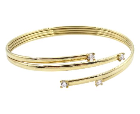 9ct gold four stone cubic zirconia bangle, hallmarkedCondition Report:Approx 5.7gm, inner circumference = 16.5cm, good condit