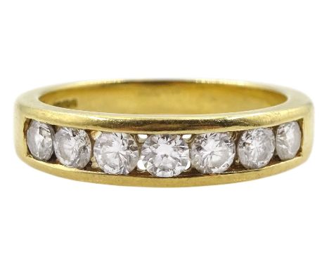 18ct gold channel set seven stone round brilliant cut diamond ring, hallmarked, total diamond weight approx 0.70 caratConditi