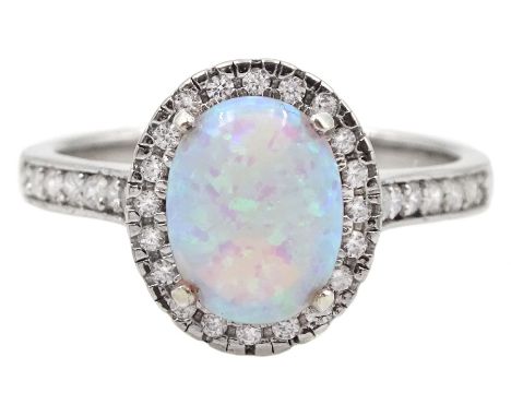 Silver opal and cubic zirconia cluster ring, stamped 925 Condition Report:Size Q, good condition 