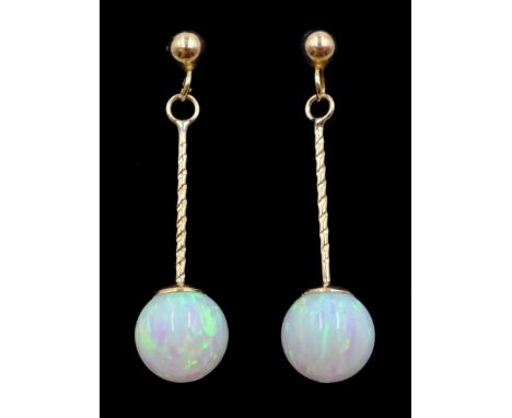 Pair of 9ct gold opal pendant earrings, stamped 375Condition Report:Length = 28mm, good condition 