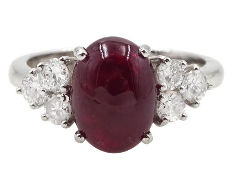 18ct white gold cabochon ruby ring, set with three round brilliant cut diamonds either side, hallmarked, ruby approx 3.20 car