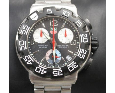 A gentleman's moder stainless steel Tag Heuer Formula 1 'Professional 200 metres' quartz wrist watch, on stainless steel Tag 