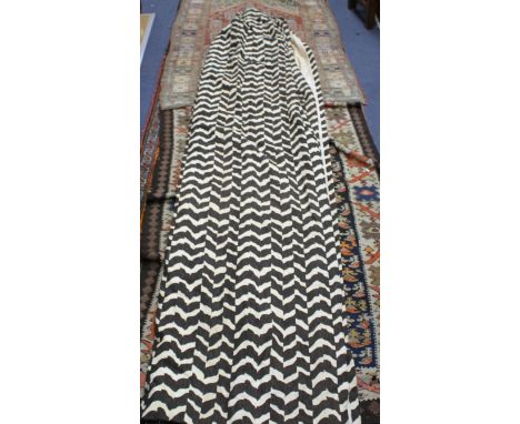 A pair of vintage 1970's zebra / chevron print curtains, lined, length 258cm, width at top 120cm, width at base 224cm Conditi