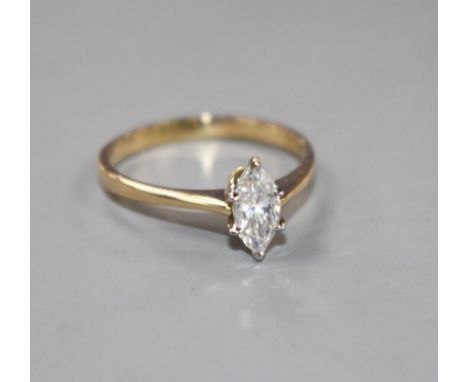 A 20th century Italian 18k yellow metal and marquise set solitaire diamond ring, size K, gross weight 1.8 grams. Condition: N