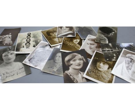 A collection of approximately forty autographed photographs and postcards of early 20th century entertainers including Gracie