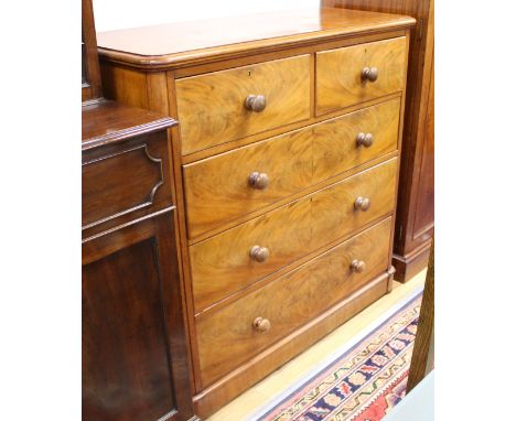 A Victorian mahogany chest of two short and three graduated long drawers, W.121cm D.53cm H.119cm Condition: Overall of light 