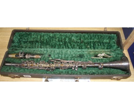 A Gladiator silver plated clarinet, cased Condition: Oxidised but otherwise in good condition, no key for locks, outer case a