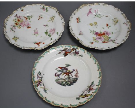 A Chelsea gold anchor 'bird and insect' plate and a similar pair of floral plates, c. 1765, 22 and 23cm Condition: All with s