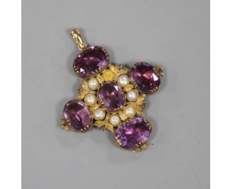 A 19th century textured yellow metal, amethyst 'and split pearl set cross pendant, 39mm, gross 9 grams. Condition: One split 