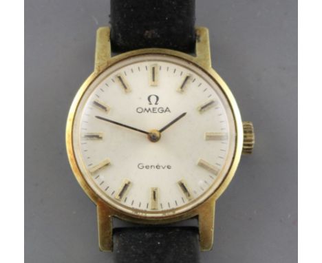 A lady's steel and gold plated Omega manual wind wrist watch, on associated leather strap. Condition: Dial diameter 21mm ex. 