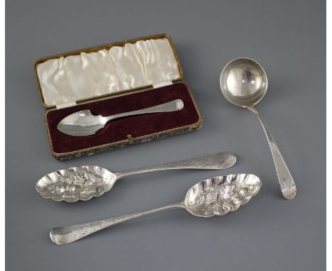 Two 18th century silver 'berry spoons' a George III silver sauce ladle, London, 1773 and a cased silver small server, Sheffie