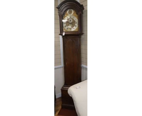 An early 19th century oak longcase clock by Thomas Brass, Guildford, H.220cm Condition: Case looks to have been restored and 