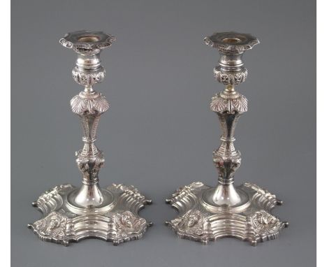 A pair of modern 18th century style Irish cast silver candlesticks, by Royal Irish Silver Co. Dublin, 1960, height 23.5cm, 69