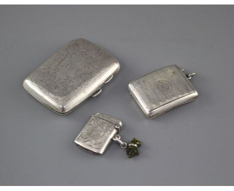 An Edwardian engraved silver cigarette case, Samuel M. Levi, Birmingham, 1905 and two similar vesta cases, cigarette case, 83