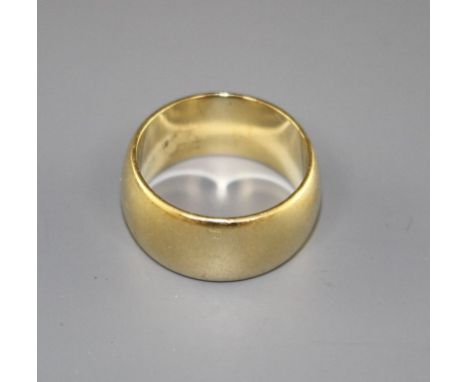 A 1970's 18ct gold wedding band, size M, 11.1 grams, Condition: Minor surface scratches in general, otherwise good condition 