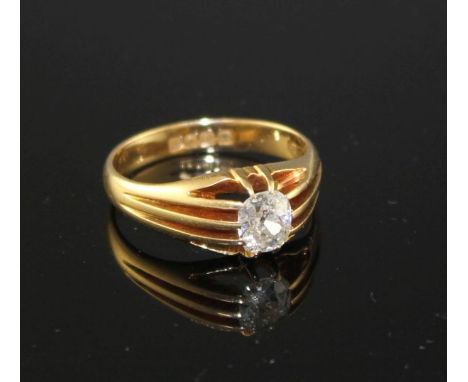 An Edwardian 18ct gold and claw set solitaire oval cut diamond ring, size P/Q, gross weight 5.1 grams. The stone weighing app