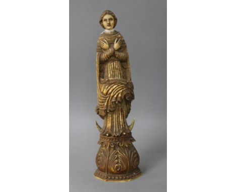 A 17th / 18th century Indo Portuguese carved and stained ivory figure of a saint, height 26cm Condition: Rather dirty with li