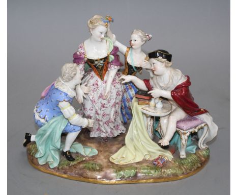 A Meissen group of an elegant lady with attendants, width 23cm, height 19cm Condition: Right hand of the kneeling man has bee