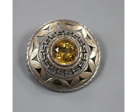 A 1960s' Sybil Dunlop pierced parcel gilt silver and citrine set target brooch, London, 1965, 32mm, gross 9.1 grams, stamped 