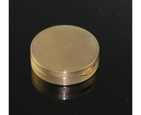 A George V engine turned 9ct gold circular compact, London, 1928, 38mm, gross 21.8 grams. Condition: Mirror plate a little ma