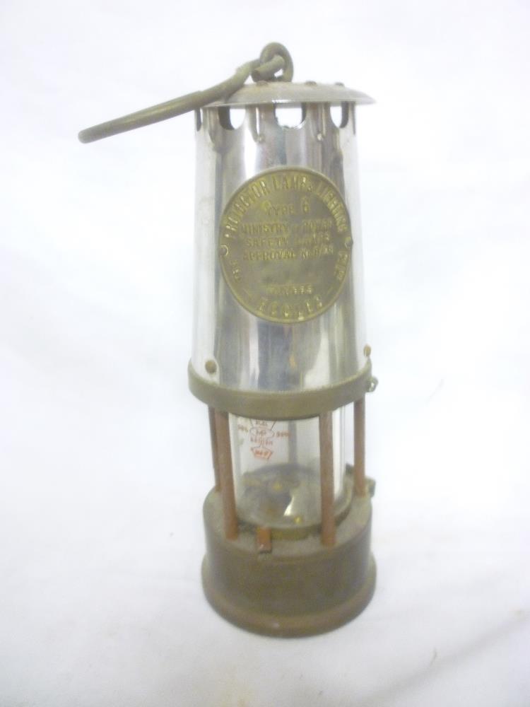 A brass and steel type 6 miner's lamp by the Protector Lamp & Lighting