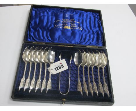 A Cased Victorian Set of Twelve Spoons and a pair of sugar tongs, presented by Lever Brothers Ltd manufacturers of Sunlight S