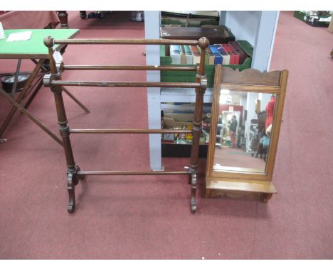 A XIX Century Mahogany Towel Rail, on shaped supports, (rail repaired); together with a XIX Century pine toilet mirror, with 