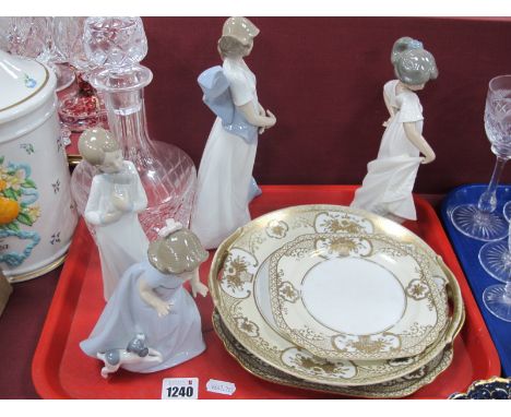 Four NAO Figurines, the largest 24.5cm, three Noritake plates, glass decanter.