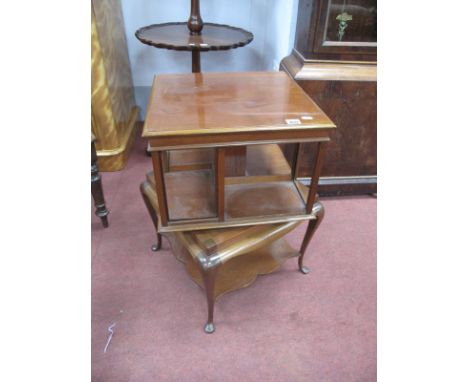 Am Early XX Century Mahogany Revolving Bookcase, with a square top, open shelves, base with cabriole legs, pad feet, with und