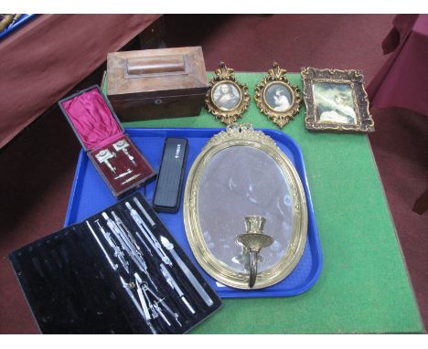 A Brass Framed Oval Wall Mirror, prints, XIX Century tea caddy, cased geometry items, Parker pen.