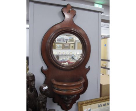 A XIX Century Mahogany Wall Mirror, with a circular mirror, half round shelf, 78cm.