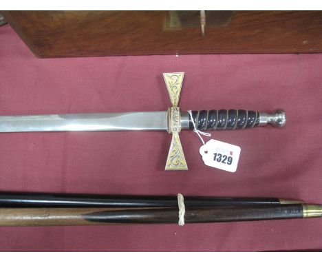 A Wilkinson Sword, with cross guard, engraved blade, 90cm.