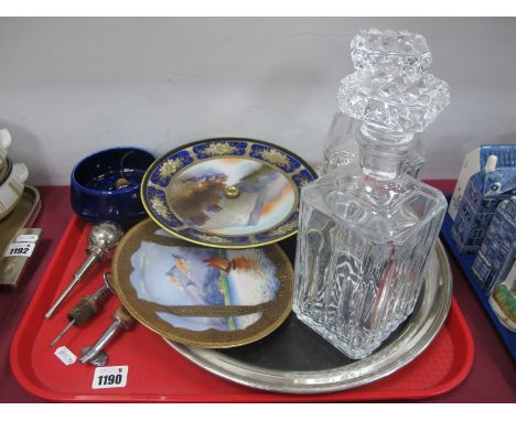 An Early XX Century Silver Plated Tray, with bakelite base, a pair of mid XX Century glass decanters, four spirit pourers, a 