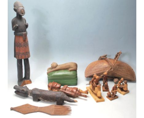 A collection of vintage 20th century African tribal caved wooden figurines to include male statue, monkey box, crocodile figu