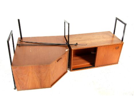 A good mid 20th Century retro vintage teak wood Ladderax type corner / wall sectional unit having a large Avalon corner compa