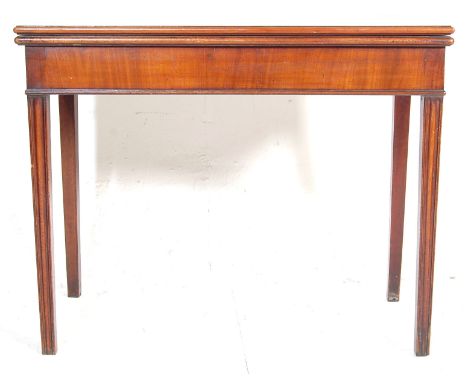 A 19th century Victorian mahogany card table / games table / tea table having a hinged rectangular top, single drawer to the 