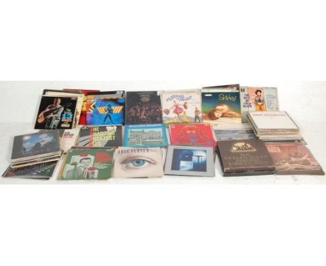 A large collection of vintage vinyl long play LP records from the 1960s, 1970s and 1980s to include Frank Sinatra, Lionel Rit