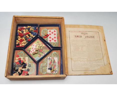 A vintage retro mid 20th century French games compendium having a fitted beautifully decorated interior set within a purpose 