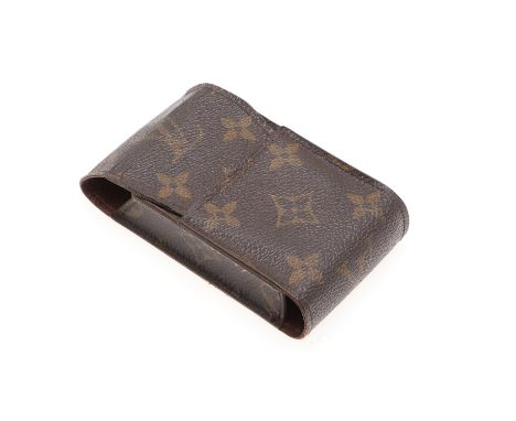 A small monogrammed cigarette case, with fold over flap and two compartments. Marked inside, 'Louis Vuitton, Paris, Made in F