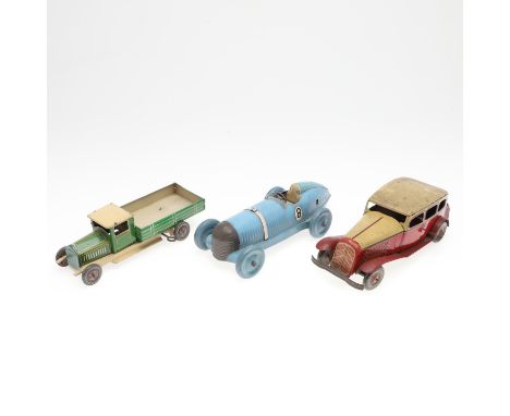 Including a Prestyn clockwork No 8 racing car in a blue livery (28cms long), also with a English clockwork lorry with tip up 