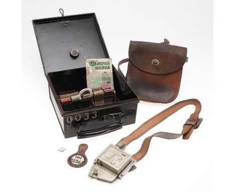 A vintage 'The Bell Punch' ticket machine, in it's original black metal tin, and with original tickets and accessories includ