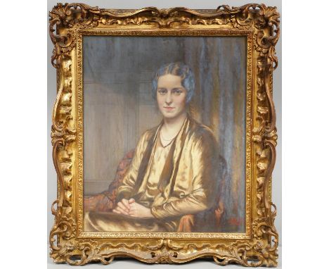 Seated half length, wearing a brown/gold dress and pearl necklace, signed with monogram and dated 1928, oil on canvas, decora