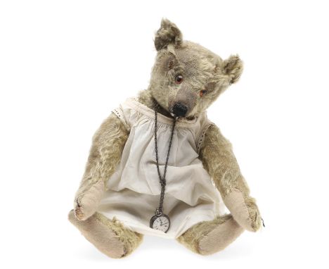 An early Steiff Teddy Bear with elongated limbs, hump back and growler mechanism (mechanism not currently working). With a bu
