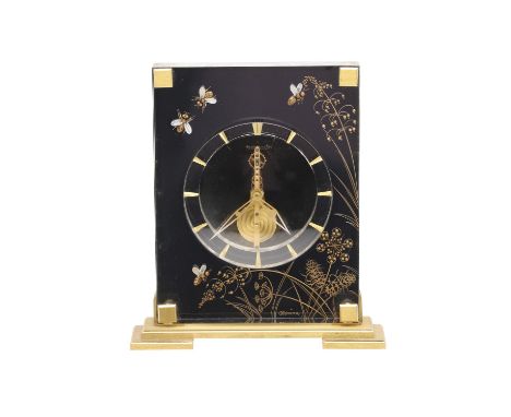 The clock with an exposed mechanism and gilt hour markers, with various bee's and flowers within a perspex case. Mounted on a