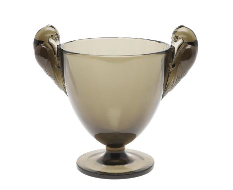 A Lalique two handled glass vase in the Ornis design, with bird shaped handles and in a topaz colour, Model No 976 and circa 